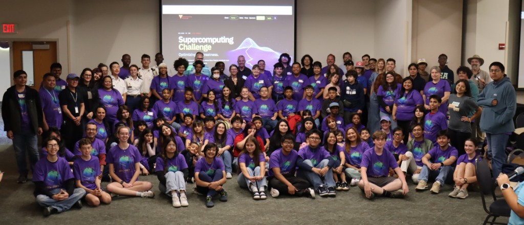 Students and adults gathered for a group photo at Kickoff