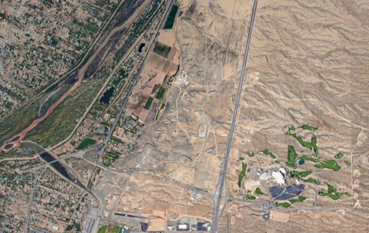 Aerial view of a river valley and desert mesas used in the runoff simulation