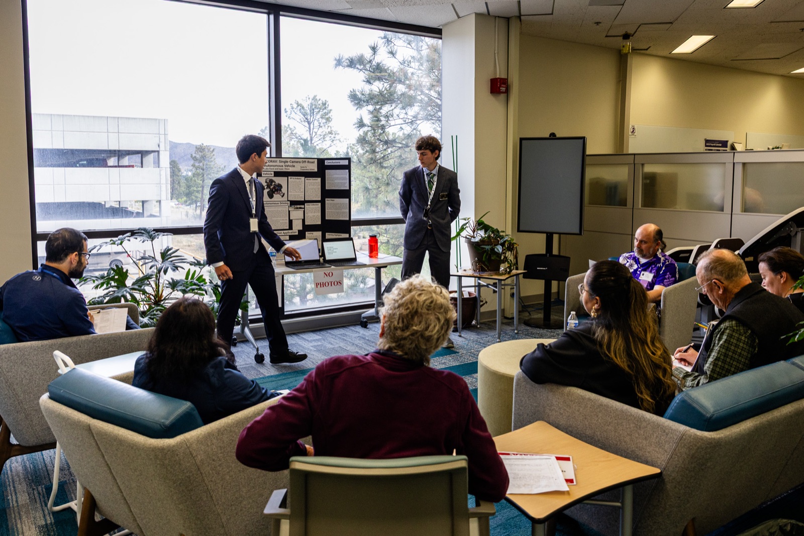 A team from Santa Fe Preparatory School presenting their project to judges at the Supercomputing Challenge Expo.